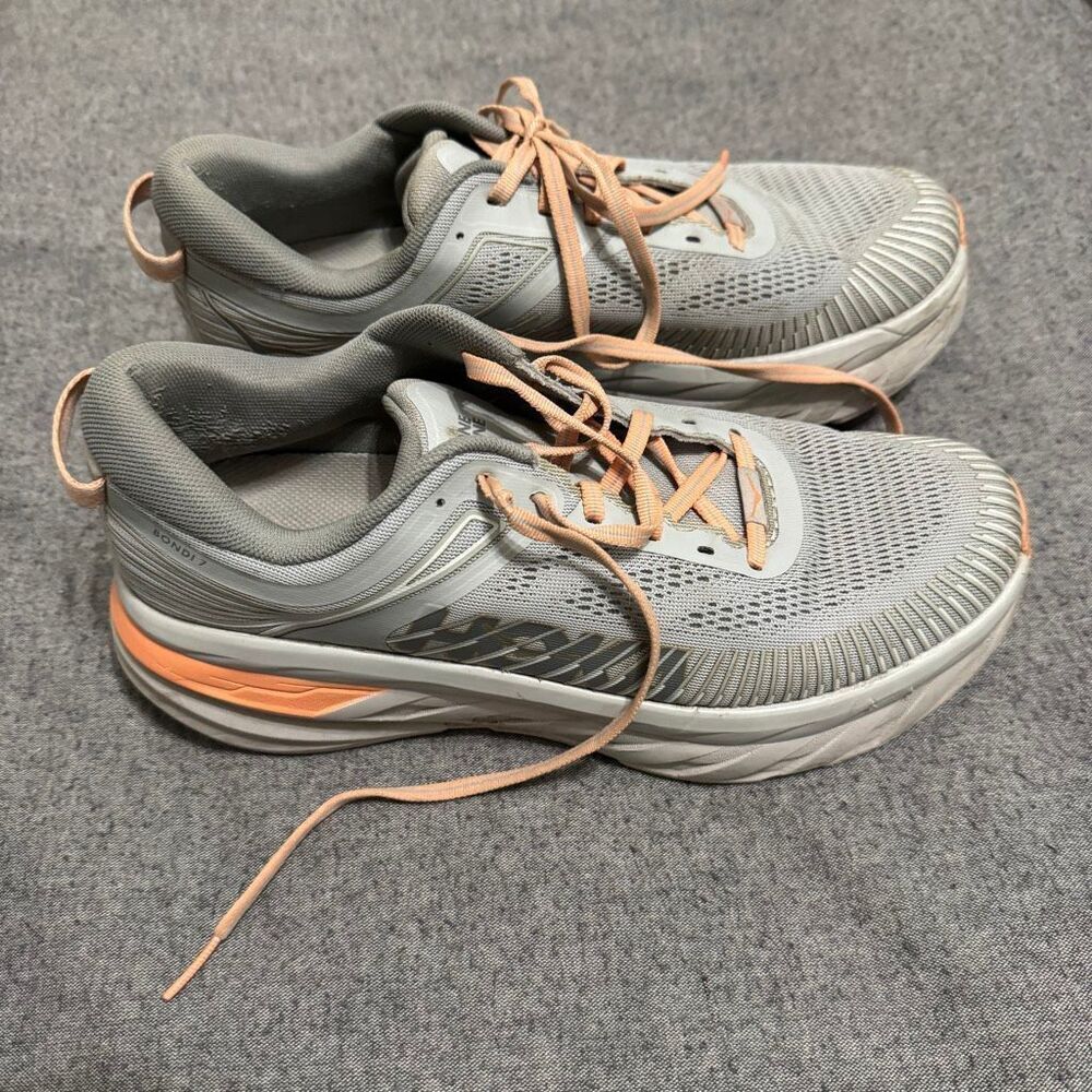 Hoka One One Bondi 7 running shoes in a grey and orange women’s size 9.5
